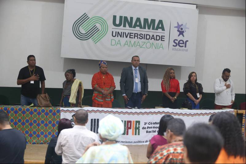 Delegados da Conferência.